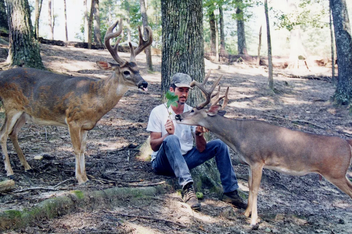 Ben Mears, founder of Mears Whitetail Forms, with a whitetail buck